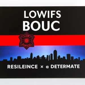 Cover of 'Badge Unbroken: The Robert Hall Story' featuring law enforcement badge and skyline.