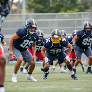 Ole Miss defensive line players practicing during training session