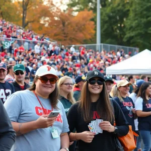 Fans celebrating at Ole Miss football game with mobile ticketing