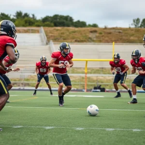 Ole Miss football team practicing defensive drills during training camp.